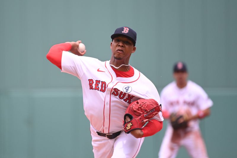 Jun 2, 2024; Boston, Massachusetts, USA; Boston Red Sox starting pitcher Brayan Bello (66) throws against the Detroit Tigers during the first inning at Fenway Park. Mandatory Credit: Eric Canha-USA TODAY Sports