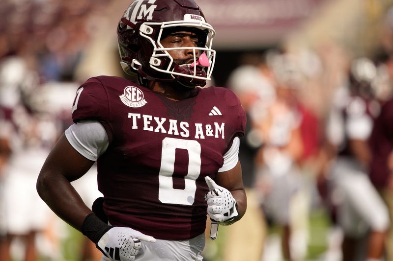 Oct 28, 2023; College Station, Texas, USA;  Texas A&M Aggies wide receiver Ainias Smith (0) warms up before the game against South Carolina Gamecocks at Kyle Field. Mandatory Credit: Dustin Safranek-USA TODAY Sports