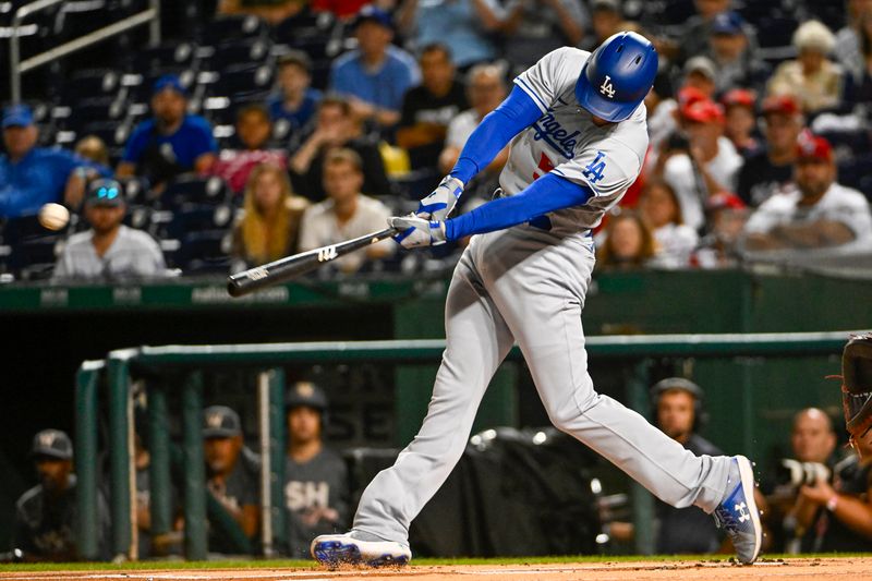 Sep 9, 2023; Washington, District of Columbia, USA; Los Angeles Dodgers first baseman Freddie Freeman (5) doubles against the Washington Nationals during the first inning at Nationals Park. Mandatory Credit: Brad Mills-USA TODAY Sports