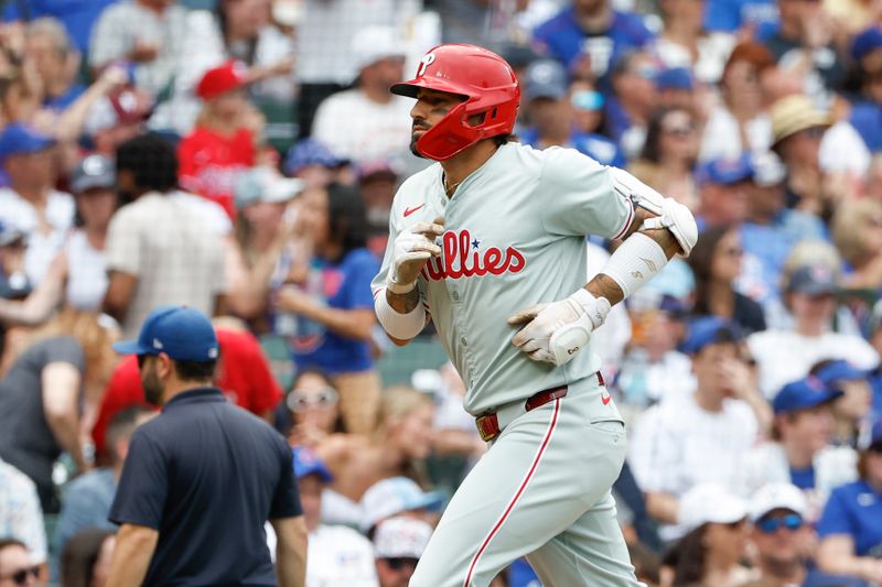 Jul 4, 2024; Chicago, Illinois, USA; Philadelphia Phillies outfielder Nick Castellanos (8) rounds the bases after hitting a solo home run against the Chicago Cubs during the fourth inning at Wrigley Field. Mandatory Credit: Kamil Krzaczynski-USA TODAY Sports