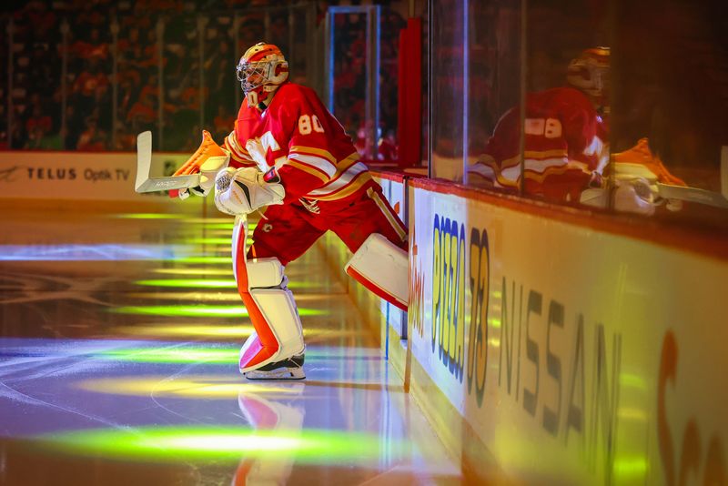 Nov 1, 2022; Calgary, Alberta, CAN; Calgary Flames goaltender Dan Vladar (80) takes the ice prior to the game against the Seattle Kraken at Scotiabank Saddledome. Mandatory Credit: Sergei Belski-USA TODAY Sports