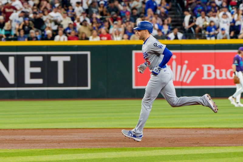 Sep 25, 2025; Phoenix, Arizona, USA; Los Angeles Dodgers infielder Freddie Freeman (5) rounds the bases after hitting a home run in the second inning against the Arizona Diamondbacks at Chase Field. Mandatory Credit: Allan Henry-Imagn Images