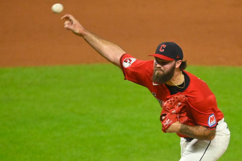 Aug 13, 2024; Cleveland, Ohio, USA; Cleveland Guardians relief pitcher Hunter Gaddis (33) delivers a pitch in the eighth inning against the Chicago Cubs at Progressive Field. Mandatory Credit: David Richard-USA TODAY Sports