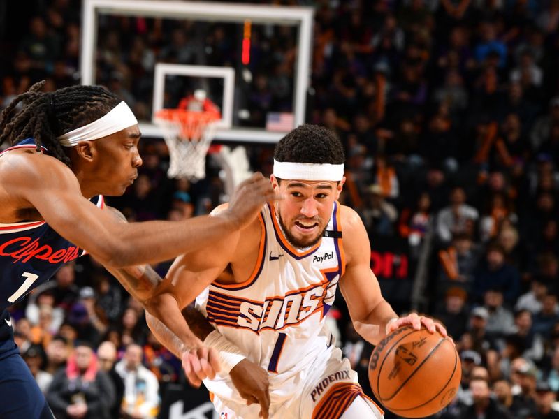 PHOENIX, AZ - JANUARY 27: Devin Booker #1 of the Phoenix Suns drives to the basket during the game against the LA Clippers on January 27, 2025 at Footprint Center in Phoenix, Arizona. NOTE TO USER: User expressly acknowledges and agrees that, by downloading and or using this photograph, user is consenting to the terms and conditions of the Getty Images License Agreement. Mandatory Copyright Notice: Copyright 2025 NBAE (Photo by Barry Gossage/NBAE via Getty Images)