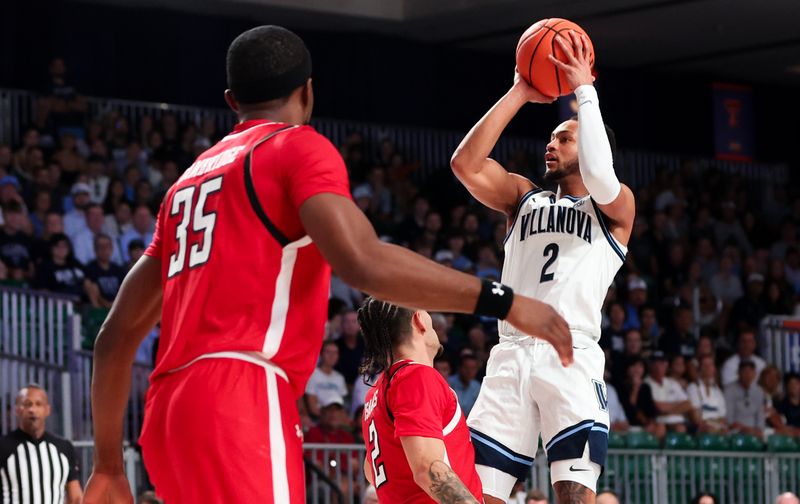 Nov 22, 2023; Paradise Island, BAHAMAS;  Villanova Wildcats guard Mark Armstrong (2) shoots over \Texas Tech Red Raiders guard Pop Isaacs (2) during the first half at Imperial Arena. Mandatory Credit: Kevin Jairaj-USA TODAY Sports