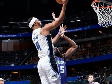 ORLANDO, FL - NOVEMBER 26: Jalen Suggs #4 of the Orlando Magic shoots the ball during the game against the Charlotte Hornets on November 26, 2023 at Amway Center in Orlando, Florida. NOTE TO USER: User expressly acknowledges and agrees that, by downloading and or using this photograph, User is consenting to the terms and conditions of the Getty Images License Agreement. Mandatory Copyright Notice: Copyright 2023 NBAE (Photo by Gary Bassing/NBAE via Getty Images)