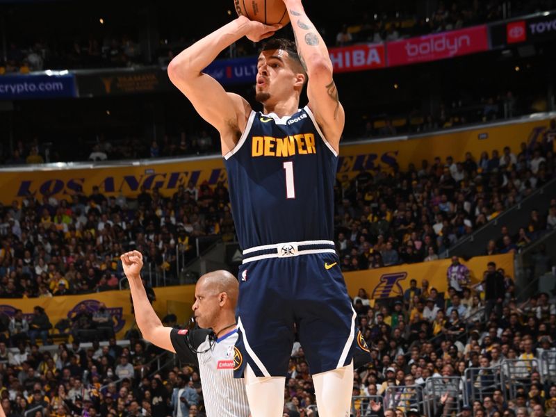 LOS ANGELES, CA - APRIL 27: Michael Porter Jr. #1 of the Denver Nuggets shoots the ball during the game against the Los Angeles Lakers during Round 1 Game 4 of the 2024 NBA Playoffs on April 27, 2024 at Crypto.Com Arena in Los Angeles, California. NOTE TO USER: User expressly acknowledges and agrees that, by downloading and/or using this Photograph, user is consenting to the terms and conditions of the Getty Images License Agreement. Mandatory Copyright Notice: Copyright 2024 NBAE (Photo by Andrew D. Bernstein/NBAE via Getty Images)