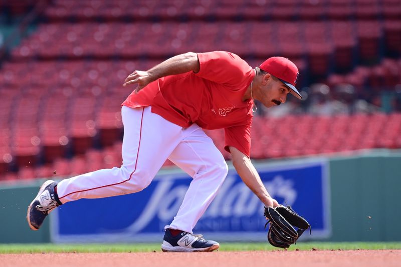 Aug 25, 2024; Boston, Massachusetts, USA; Boston Red Sox catcher Mickey Gasper (77) warms up before a game against the Arizona Diamondbacks at Fenway Park. Mandatory Credit: Eric Canha-USA TODAY Sports