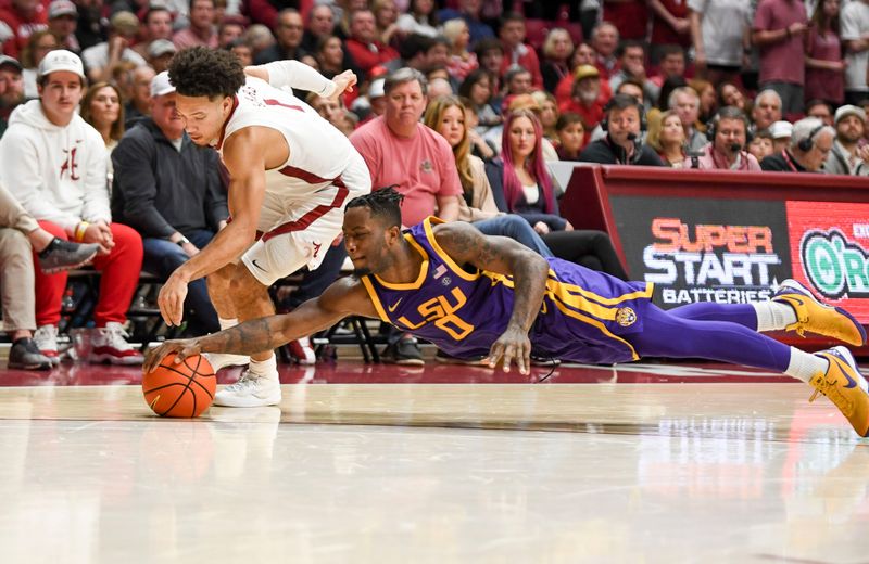 Jan 27, 2024; Tuscaloosa, Alabama, USA;   LSU guard Trae Hannibal (0) makes a diving steal from 
Alabama guard Mark Sears (1) at Coleman Coliseum. Alabama defeated LSU 109-88. Mandatory Credit: Gary Cosby Jr.-USA TODAY Sports