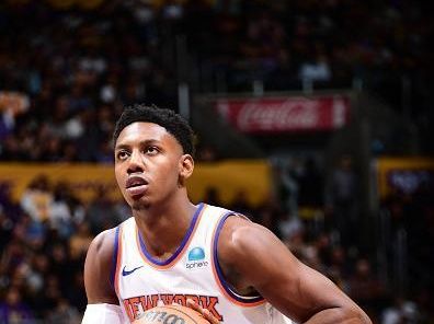 LOS ANGELES, CA - DECEMBER 18:  RJ Barrett #9 of the New York Knicks shoots a free throw during the game  on December 18, 2023 at Crypto.Com Arena in Los Angeles, California. NOTE TO USER: User expressly acknowledges and agrees that, by downloading and/or using this Photograph, user is consenting to the terms and conditions of the Getty Images License Agreement. Mandatory Copyright Notice: Copyright 2023 NBAE (Photo by Adam Pantozzi/NBAE via Getty Images)