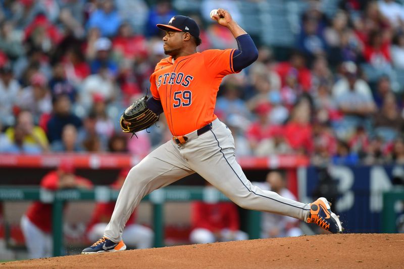 Jun 7, 2024; Anaheim, California, USA; Houston Astros pitcher Framber Valdez (59) throws against the Los Angeles Angels during the third inning at Angel Stadium. Mandatory Credit: Gary A. Vasquez-USA TODAY Sports