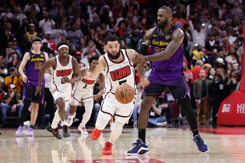 HOUSTON, TEXAS - JANUARY 05: LeBron James #23 of the Los Angeles Lakers fouls Fred VanVleet #5 of the Houston Rockets during the second half at Toyota Center on January 05, 2025 in Houston, Texas. NOTE TO USER: User expressly acknowledges and agrees that, by downloading and or using this photograph, User is consenting to the terms and conditions of the Getty Images License Agreement.  (Photo by Alex Slitz/Getty Images)