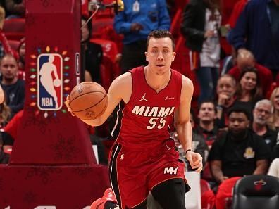 MIAMI, FL - DECEMBER 25:  Duncan Robinson #55 of the Miami Heat handles the ball during the game  on December 25, 2023 at Kaseya Center Arena in Miami, Florida. NOTE TO USER: User expressly acknowledges and agrees that, by downloading and or using this Photograph, user is consenting to the terms and conditions of the Getty Images License Agreement. Mandatory Copyright Notice: Copyright 2023 NBAE (Photo by Issac Baldizon/NBAE via Getty Images)