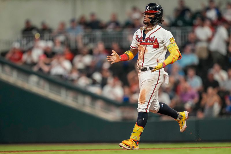 Aug 22, 2023; Cumberland, Georgia, USA; Atlanta Braves right fielder Ronald Acuna Jr. (13) reacts after hitting a ground rule double against the New York Mets during the eighth inning at Truist Park. Mandatory Credit: Dale Zanine-USA TODAY Sports