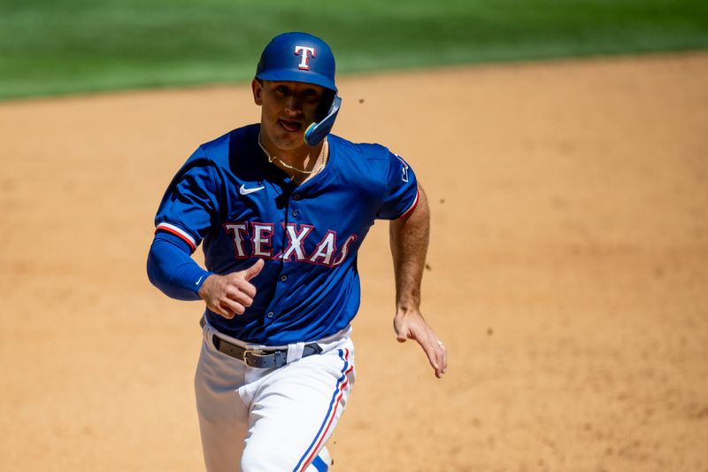 Mar 26, 2024; Arlington, Texas, USA; Texas Rangers left field Wyatt Langford (82) runs to third base during the sixth inning against the Boston Red Sox at Globe Life Field. Mandatory Credit: Jerome Miron-USA TODAY Sports