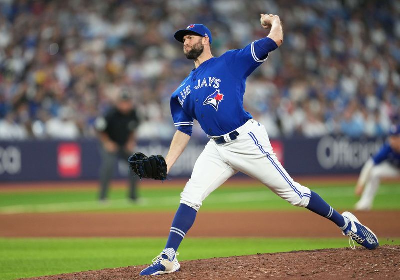 May 31, 2023; Toronto, Ontario, CAN; Toronto Blue Jays relief pitcher Tim Mayza (58) throws a pitch against the Milwaukee Brewers during the seventh inning at Rogers Centre. Mandatory Credit: Nick Turchiaro-USA TODAY Sports
