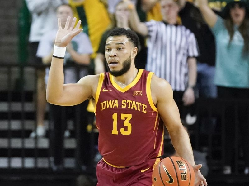 Mar 4, 2023; Waco, Texas, USA; Iowa State Cyclones guard Jaren Holmes (13) bring the ball up court against the Baylor Bears during the first half at Ferrell Center. Mandatory Credit: Raymond Carlin III-USA TODAY Sports