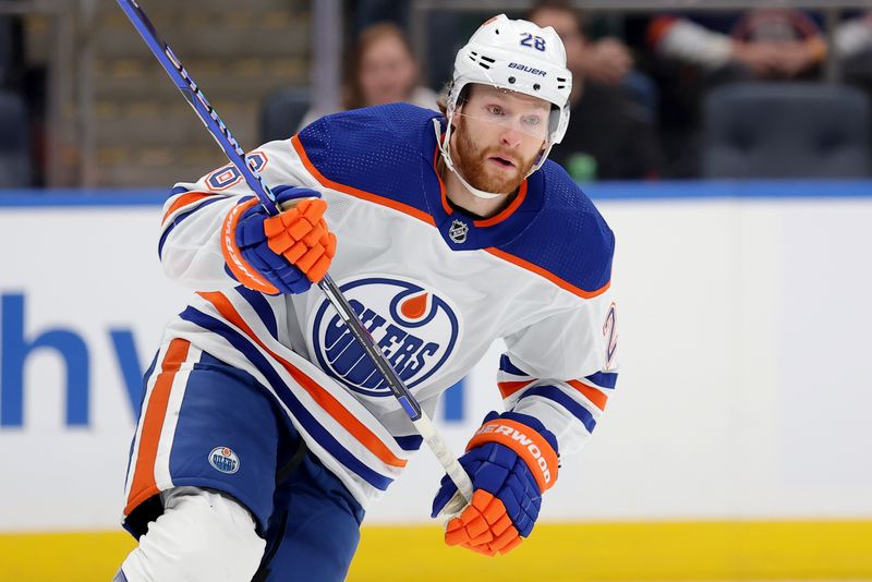 Dec 19, 2023; Elmont, New York, USA; Edmonton Oilers right wing Connor Brown (28) skates against the New York Islanders during the first period at UBS Arena. Mandatory Credit: Brad Penner-USA TODAY Sports