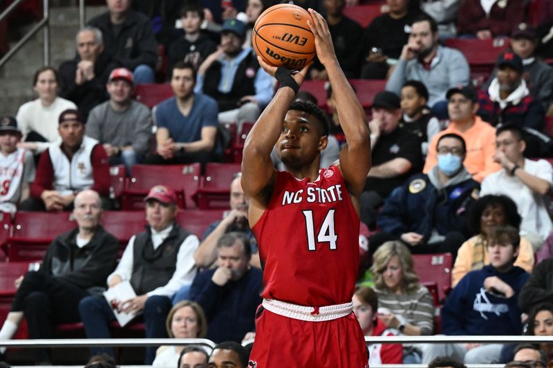 Feb 11, 2023; Chestnut Hill, Massachusetts, USA; North Carolina State Wolfpack guard Casey Morsell (14) attempts a three-point basket against the Boston College Eagles during the first half at the Conte Forum. Mandatory Credit: Brian Fluharty-USA TODAY Sports