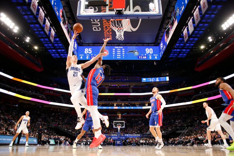 DETROIT, MI - FEBRUARY 24:  Moritz Wagner #21 of the Orlando Magic goes to the basket during the game on February 24, 2024 at Little Caesars Arena in Detroit, Michigan. NOTE TO USER: User expressly acknowledges and agrees that, by downloading and/or using this photograph, User is consenting to the terms and conditions of the Getty Images License Agreement. Mandatory Copyright Notice: Copyright 2024 NBAE (Photo by Brian Sevald/NBAE via Getty Images)