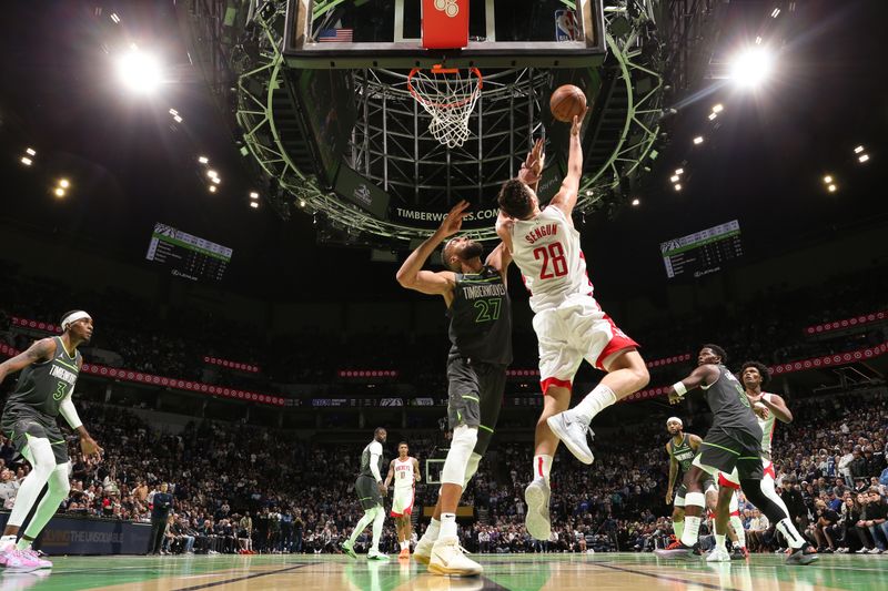 MINNEAPOLIS, MN -  NOVEMBER 26: Alperen Sengun #28 of the Houston Rockets drives to the basket during the game against the Minnesota Timberwolves during the Emirates NBA Cup game on November 26, 2024 at Target Center in Minneapolis, Minnesota. NOTE TO USER: User expressly acknowledges and agrees that, by downloading and or using this Photograph, user is consenting to the terms and conditions of the Getty Images License Agreement. Mandatory Copyright Notice: Copyright 2024 NBAE (Photo by David Sherman/NBAE via Getty Images)