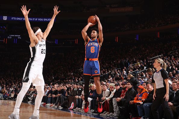 NEW YORK, NY - NOVEMBER 8: Quentin Grimes #6 of the New York Knicks shoots a three point basket against the San Antonio Spurs on Novmeber 8, 2023 at Madison Square Garden in New York City, New York.  NOTE TO USER: User expressly acknowledges and agrees that, by downloading and or using this photograph, User is consenting to the terms and conditions of the Getty Images License Agreement. Mandatory Copyright Notice: Copyright 2023 NBAE  (Photo by Nathaniel S. Butler/NBAE via Getty Images)