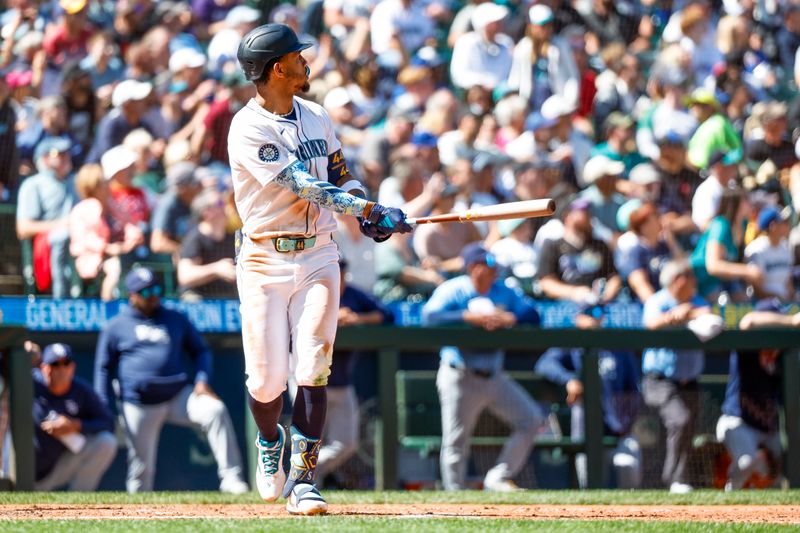 Aug 28, 2024; Seattle, Washington, USA; Seattle Mariners center fielder Julio Rodriguez (44) hits a two-run home run against the Tampa Bay Rays during the fifth inning at T-Mobile Park. Mandatory Credit: Joe Nicholson-USA TODAY Sports
