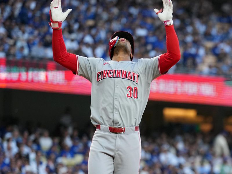 May 16, 2024; Los Angeles, California, USA; Cincinnati Reds center fielder Will Benson (30) celebrates after hitting a home run in the first inning against the Los Angeles Dodgers at Dodger Stadium. Mandatory Credit: Kirby Lee-USA TODAY Sports