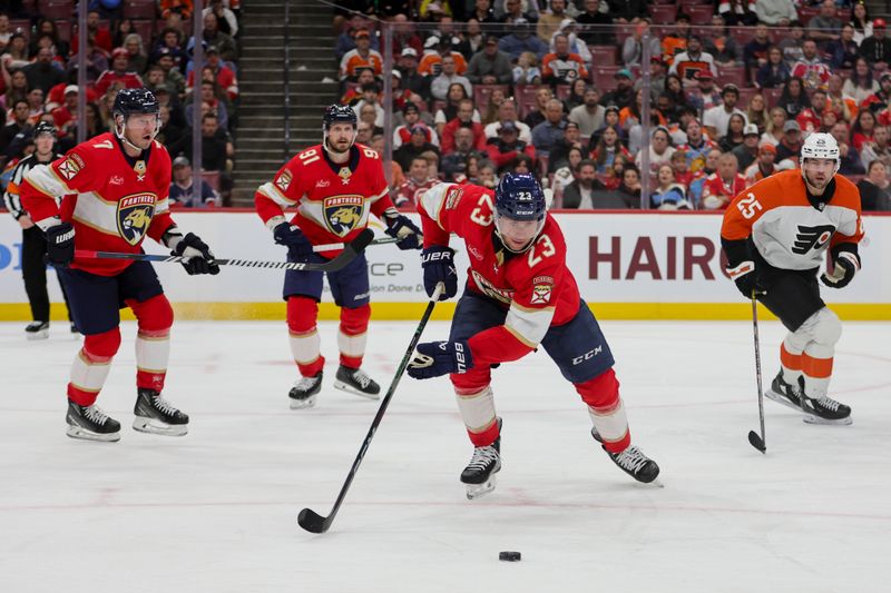 Feb 6, 2024; Sunrise, Florida, USA; Florida Panthers center Carter Verhaeghe (23) moves the puck against the Philadelphia Flyers during the third period at Amerant Bank Arena. Mandatory Credit: Sam Navarro-USA TODAY Sports