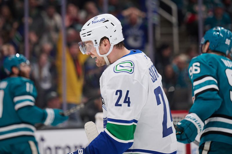 Nov 2, 2024; San Jose, California, USA; Vancouver Canucks center Pius Suter (24) reacts after scoring the game-winning goal against the San Jose Sharks during the third period at SAP Center at San Jose. Mandatory Credit: Robert Edwards-Imagn Images