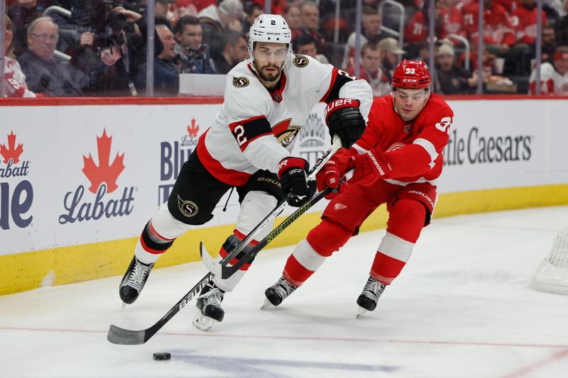 Jan 31, 2024; Detroit, Michigan, USA;  Ottawa Senators defenseman Artem Zub (2) skates with the puck chased by Detroit Red Wings right wing Alex DeBrincat (93) in the second period at Little Caesars Arena. Mandatory Credit: Rick Osentoski-USA TODAY Sports