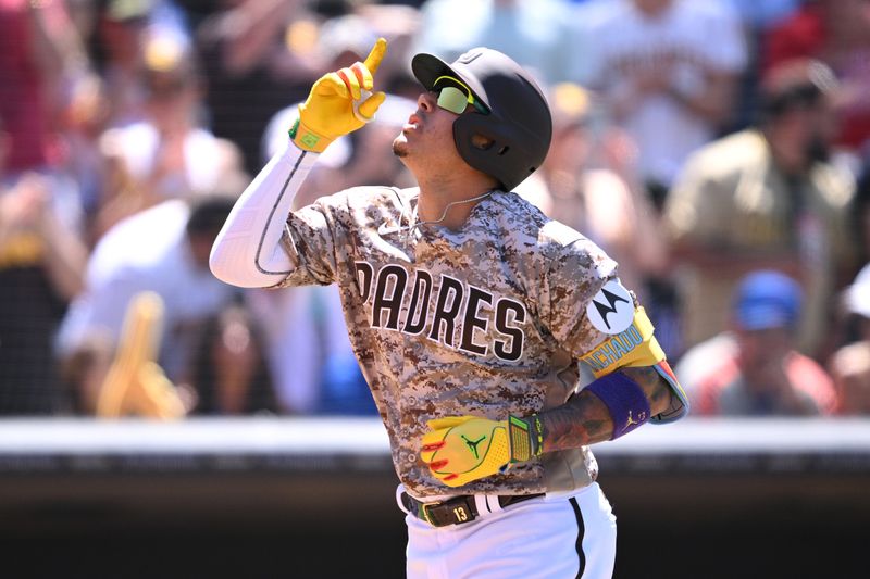 Jul 9, 2023; San Diego, California, USA; San Diego Padres third baseman Manny Machado (13) gestures after hitting a two-run home run against the New York Mets during the fifth inning at Petco Park. Mandatory Credit: Orlando Ramirez-USA TODAY Sports