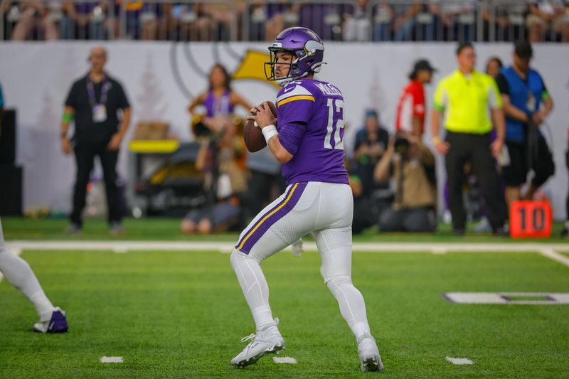 Minnesota Vikings quarterback Nick Mullens looks to throw a pass against the Tennessee Titans in the first half of a preseason NFL football game, Saturday, Aug. 19, 2023, in Minneapolis. (AP Photo/Bruce Kluckhohn)