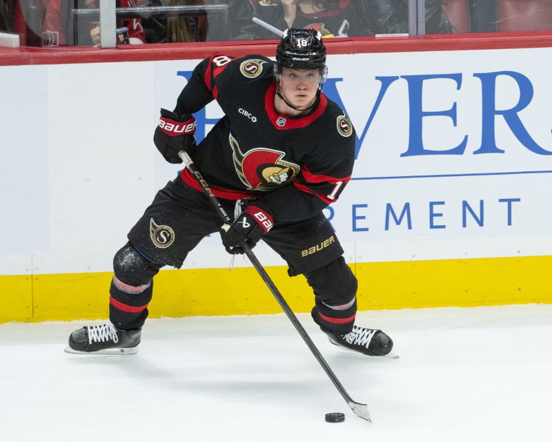 Jan 24, 2026; Ottawa, Ontario, CAN; Ottawa Senators center Tim Stutzle (18) controls the puck in the third period against the Carolina Hurricanes at the Canadian Tire Centre. Mandatory Credit: Marc DesRosiers-IMAGN Images