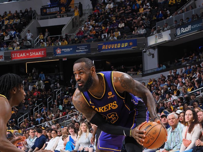 INDIANAPOLIS, IN - MARCH 29:  LeBron James #23 of the Los Angeles Lakers handles the ball during the game against the Indiana Pacers on March 29, 2024 at Gainbridge Fieldhouse in Indianapolis, Indiana. NOTE TO USER: User expressly acknowledges and agrees that, by downloading and or using this Photograph, user is consenting to the terms and conditions of the Getty Images License Agreement. Mandatory Copyright Notice: Copyright 2024 NBAE (Photo by Ron Hoskins/NBAE via Getty Images)