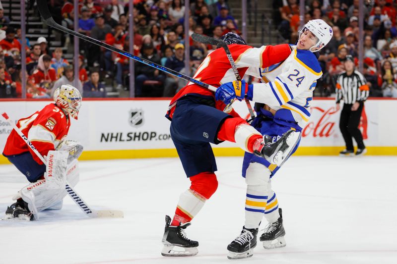 Apr 4, 2023; Sunrise, Florida, USA; Florida Panthers defenseman Brandon Montour (62) and Buffalo Sabres center Dylan Cozens (24) collide during the first period at FLA Live Arena. Mandatory Credit: Sam Navarro-USA TODAY Sports