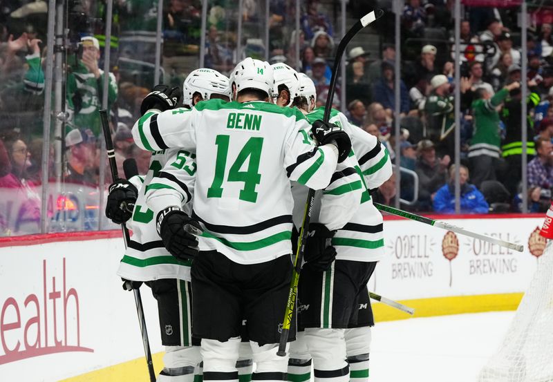 Apr 7, 2024; Denver, Colorado, USA; Dallas Stars center Wyatt Johnston (53) (left) celebrates his goal with teammates in the third period against the Colorado Avalanche at Ball Arena. Mandatory Credit: Ron Chenoy-USA TODAY Sports