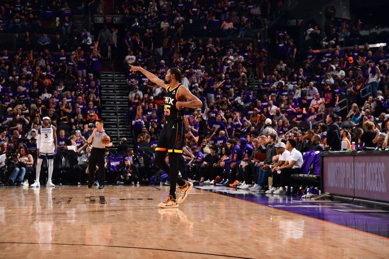 PHOENIX, AZ - APRIL  28: Kevin Durant #35 of the Phoenix Suns sets the play during the game against the Minnesota Timberwolves during Round 1 Game 4 of the 2024 NBA Playoffs on April 28, 2024 at Footprint Center in Phoenix, Arizona. NOTE TO USER: User expressly acknowledges and agrees that, by downloading and or using this photograph, user is consenting to the terms and conditions of the Getty Images License Agreement. Mandatory Copyright Notice: Copyright 2024 NBAE (Photo by Kate Frese/NBAE via Getty Images)