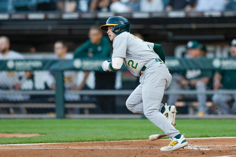 Aug 25, 2023; Chicago, Illinois, USA; Oakland Athletics shortstop Nick Allen (2) hits an RBI-single against the Chicago White Sox during the second inning at Guaranteed Rate Field. Mandatory Credit: Kamil Krzaczynski-USA TODAY Sports