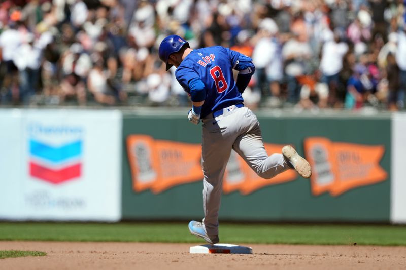 Jun 27, 2024; San Francisco, California, USA; Chicago Cubs designated hitter Ian Happ (8) rounds the bases after hitting a home run against the San Francisco Giants during the tenth inning at Oracle Park. Mandatory Credit: Darren Yamashita-USA TODAY Sports