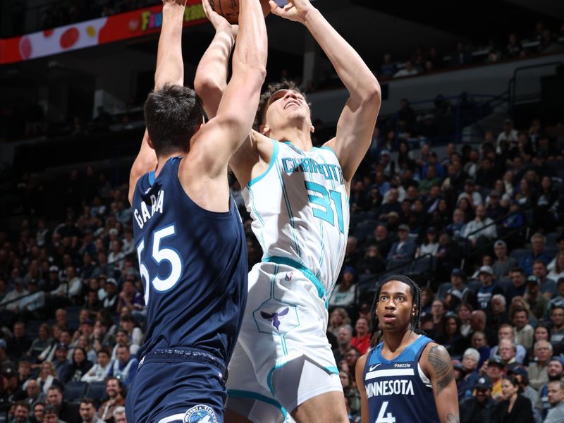 MINNEAPOLIS, MN -  NOVEMBER 4: Tidjane Salaun #31 of the Charlotte Hornets shoots the ball during the game against the Minnesota Timberwolves on November 4, 2024 at Target Center in Minneapolis, Minnesota. NOTE TO USER: User expressly acknowledges and agrees that, by downloading and or using this Photograph, user is consenting to the terms and conditions of the Getty Images License Agreement. Mandatory Copyright Notice: Copyright 2024 NBAE (Photo by David Sherman/NBAE via Getty Images)