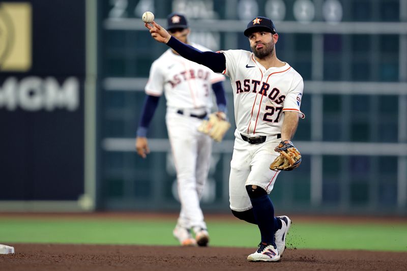 Sep 7, 2024; Houston, Texas, USA; Houston Astros second baseman Jose Altuve (27) throws a fielded ball to first base for an out against the Arizona Diamondbacks during the sixth inning at Minute Maid Park. Mandatory Credit: Erik Williams-Imagn Images
