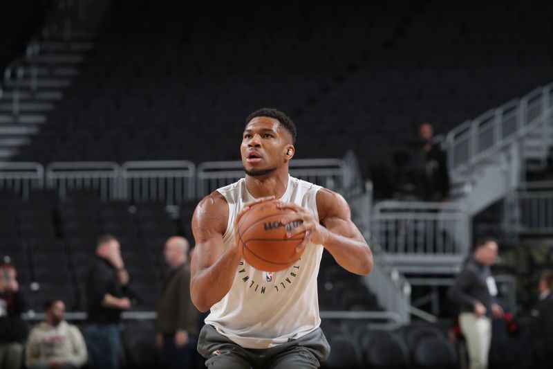 MILWAUKEE, WI - NOVEMBER 18: Giannis Antetokounmpo #34 of the Milwaukee Bucks warms up before the game against the Houston Rockets on November 18, 2024 at the Fiserv Forum Center in Milwaukee, Wisconsin. NOTE TO USER: User expressly acknowledges and agrees that, by downloading and or using this Photograph, user is consenting to the terms and conditions of the Getty Images License Agreement. Mandatory Copyright Notice: Copyright 2024 NBAE (Photo by Gary Dineen/NBAE via Getty Images).