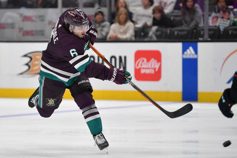 Dec 23, 2023; Anaheim, California, USA; Anaheim Ducks defenseman Jamie Drysdale (6) shoots on goal against the Seattle Kraken during the second period at Honda Center. Mandatory Credit: Gary A. Vasquez-USA TODAY Sports