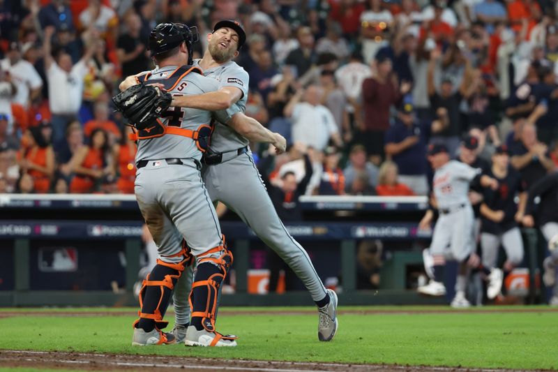 Oct 2, 2024; Houston, Texas, USA; Detroit Tigers pitcher Will Vest (19) and catcher Jake Rogers (34) celebrate after defeating the Houston Astros in game two of the Wildcard round for the 2024 MLB Playoffs at Minute Maid Park. Mandatory Credit: Thomas Shea-Imagn Images