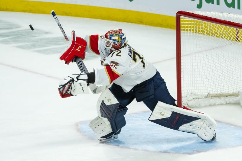 Apr 5, 2025; Ottawa, Ontario, CAN; Florida Panthers goalie Sergei Bobrovsky (72) makes a save in the third period against the Ottawa Senators at the Canadian Tire Centre. Mandatory Credit: Marc DesRosiers-Imagn Images