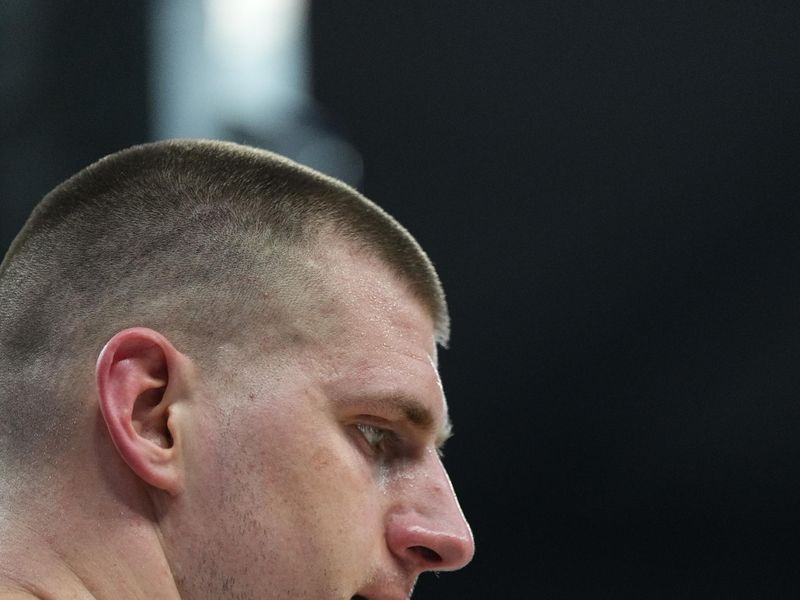 AUSTIN, TX - MARCH 15: Nikola Jokic #15 of the Denver Nuggets looks on during the game against the San Antonio Spurs on March 15, 2024 at the Moody Center in Austin, Texas. NOTE TO USER: User expressly acknowledges and agrees that, by downloading and/or using this Photograph, user is consenting to the terms and conditions of the Getty Images License Agreement. Mandatory Copyright Notice: Copyright 2024 NBAE (Photo by Garrett Ellwood/NBAE via Getty Images)