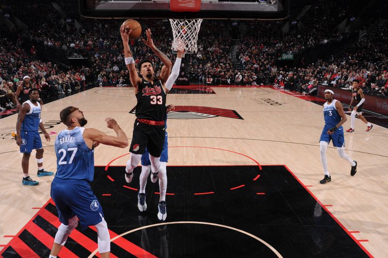 PORTLAND, OR - FEBRUARY 15: Toumani Camara #33 of the Portland Trail Blazers drives to the basket during the game against the Minnesota Timberwolves on February 15, 2024 at the Moda Center Arena in Portland, Oregon. NOTE TO USER: User expressly acknowledges and agrees that, by downloading and or using this photograph, user is consenting to the terms and conditions of the Getty Images License Agreement. Mandatory Copyright Notice: Copyright 2024 NBAE (Photo by Cameron Browne/NBAE via Getty Images)