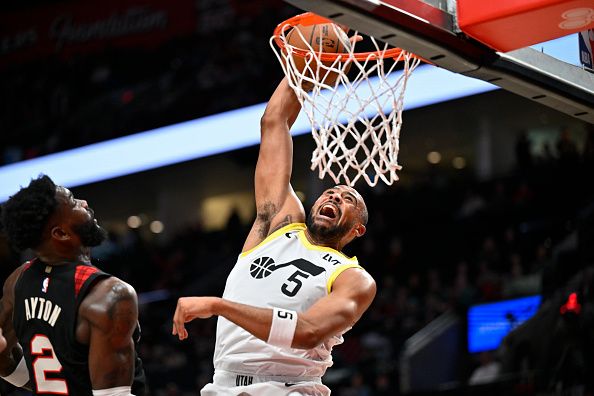 PORTLAND, OREGON - DECEMBER 14: Talen Horton-Tucker #5 of the Utah Jazz dunks during the first quarter of the game \H at Moda Center on December 14, 2023 in Portland, Oregon. NOTE TO USER: User expressly acknowledges and agrees that, by downloading and or using this Photograph, user is consenting to the terms and conditions of the Getty Images License Agreement. (Photo by Alika Jenner/Getty Images)