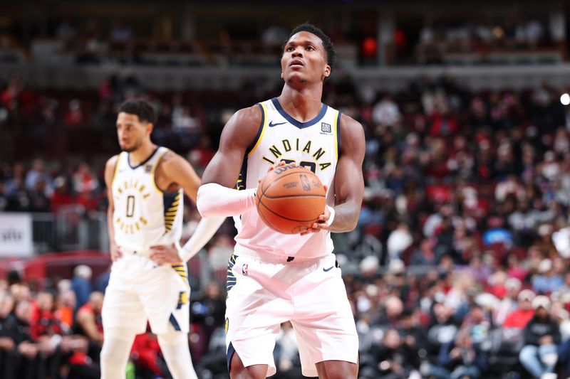 CHICAGO, IL - DECEMBER 6: Bennedict Mathurin #00 of the Indiana Pacers shoots a free throw during the game against the Chicago Bulls on December 6, 2024 at United Center in Chicago, Illinois. NOTE TO USER: User expressly acknowledges and agrees that, by downloading and or using this photograph, User is consenting to the terms and conditions of the Getty Images License Agreement. Mandatory Copyright Notice: Copyright 2024 NBAE (Photo by Jeff Haynes/NBAE via Getty Images)